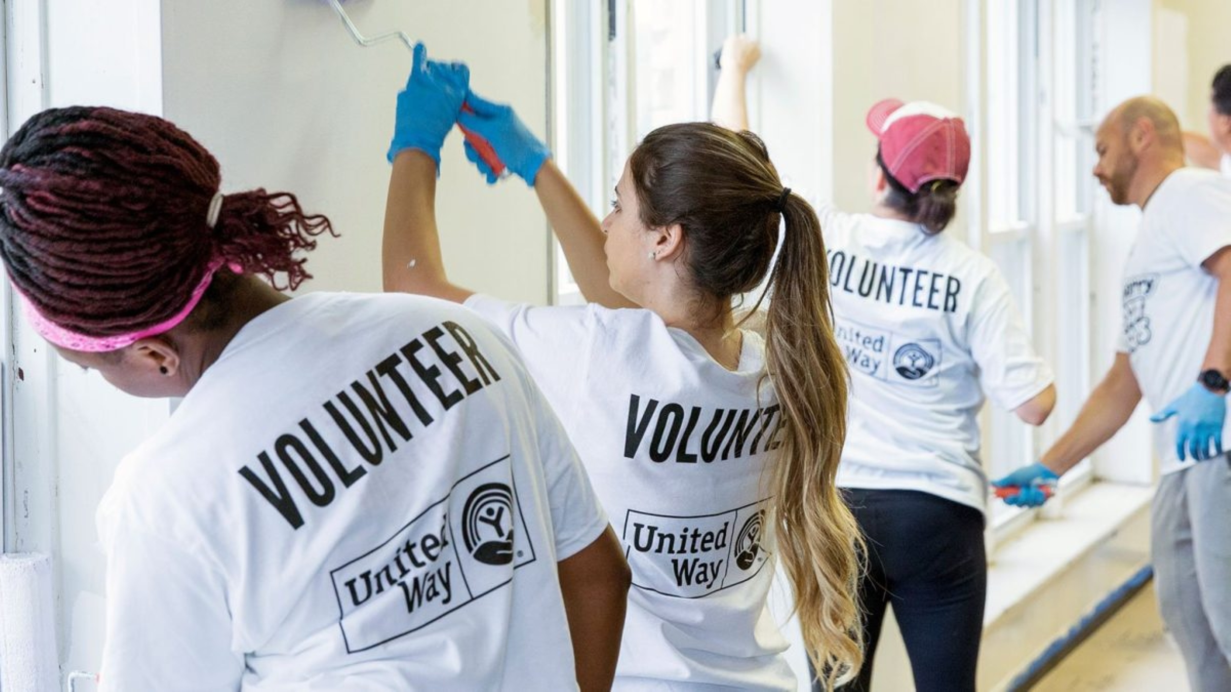 Volunteers work together to get the job done