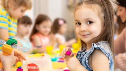 Children play together at daycare